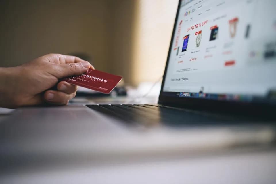 Online shopping on a laptop during an ecommerce store migration